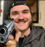 Jschlatt gun meme.png